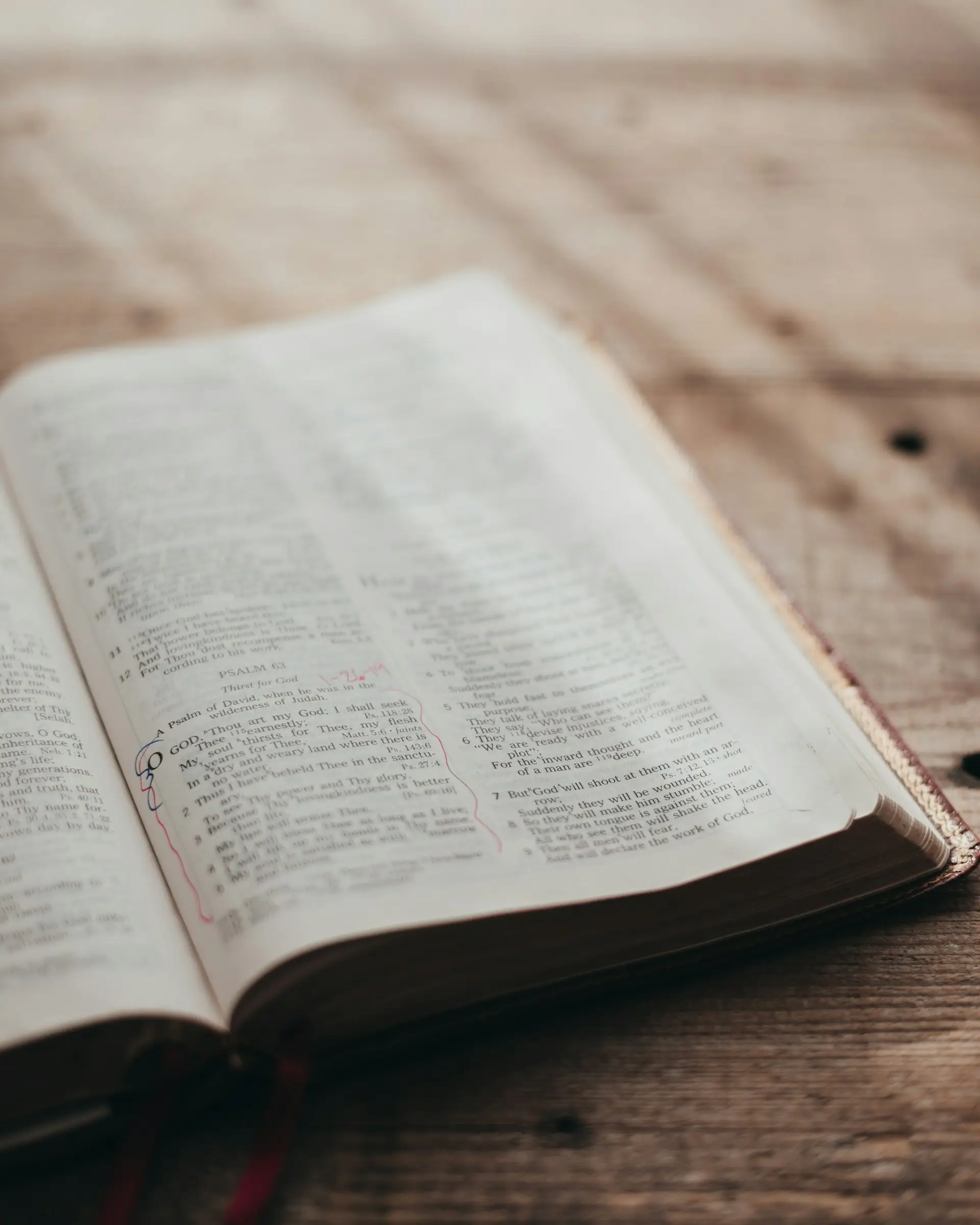 Open Bible on a wooden table
