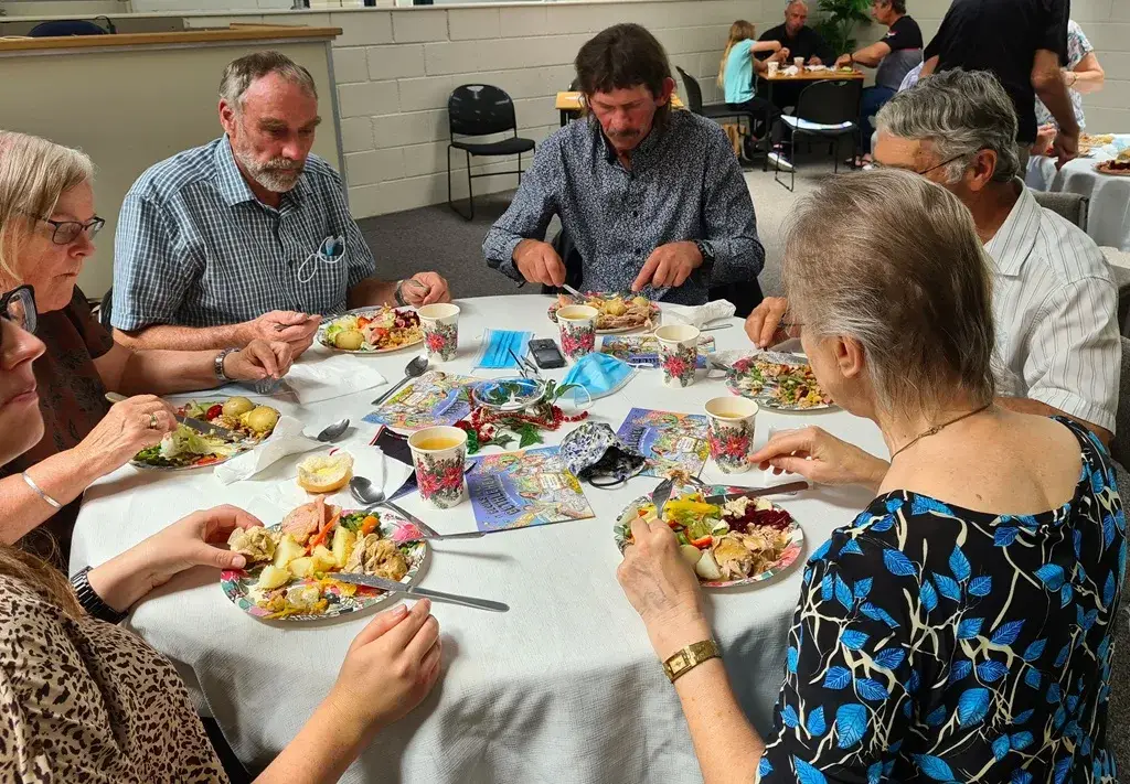 Lifegate community sharing a meal together